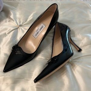 Never worn Jimmy Choo Black patent leather pumps. Patent leather, original box.
